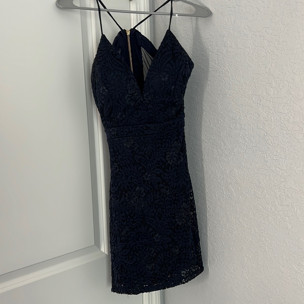 Dark blue body con homecoming dress size xs with mesh open back and zipper